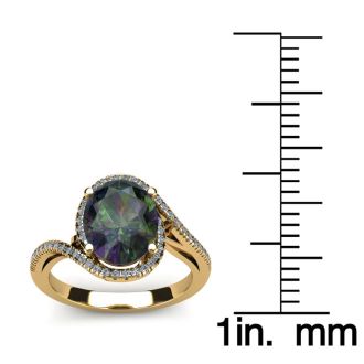 1-1/3 Carat Oval Shape Mystic Topaz Ring With Swirling Diamond Halo In 14 Karat Yellow Gold