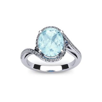 Aquamarine Ring: Aquamarine Jewelry: 1 1/3 Carat Oval Shape Aquamarine and Halo Diamond Ring In 14 Karat White Gold