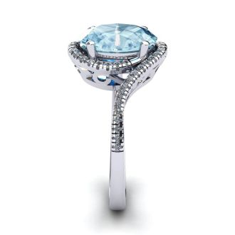 Aquamarine Ring: Aquamarine Jewelry: 1 1/3 Carat Oval Shape Aquamarine and Halo Diamond Ring In 14 Karat White Gold
