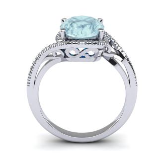 Aquamarine Ring: Aquamarine Jewelry: 1 1/3 Carat Oval Shape Aquamarine and Halo Diamond Ring In 14 Karat White Gold