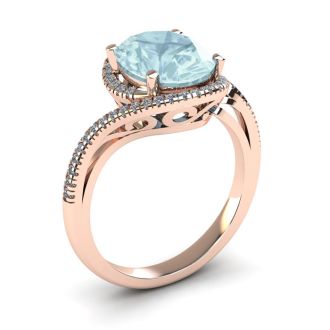 Aquamarine Ring: Aquamarine Jewelry: 1 1/3 Carat Oval Shape Aquamarine and Halo Diamond Ring In 14 Karat Rose Gold
