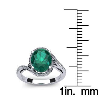1 1/3 Carat Oval Shape Emerald and Halo Diamond Ring In 14 Karat White Gold