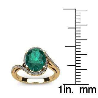 1 1/3 Carat Oval Shape Emerald and Halo Diamond Ring In 14 Karat Yellow Gold