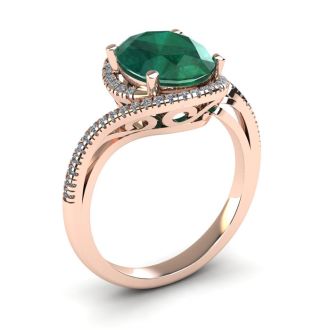 1 1/3 Carat Oval Shape Emerald and Halo Diamond Ring In 14 Karat Rose Gold