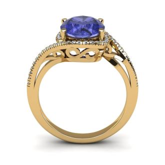 1 1/2 Carat Oval Shape Tanzanite and Halo Diamond Ring In 14 Karat Yellow Gold