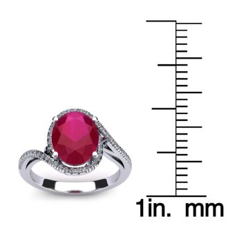 1 3/4 Carat Oval Shape Ruby and Halo Diamond Ring In 14 Karat White Gold