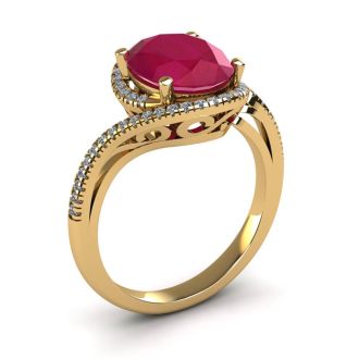 1 3/4 Carat Oval Shape Ruby and Halo Diamond Ring In 14 Karat Yellow Gold