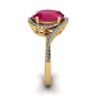 1 3/4 Carat Oval Shape Ruby and Halo Diamond Ring In 14 Karat Yellow Gold