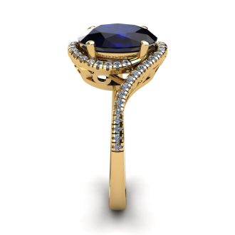 1 3/4 Carat Oval Shape Sapphire and Halo Diamond Ring In 14 Karat Yellow Gold