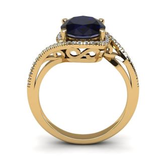 1 3/4 Carat Oval Shape Sapphire and Halo Diamond Ring In 14 Karat Yellow Gold