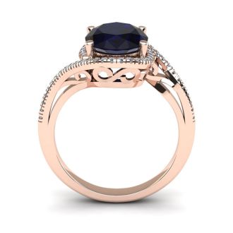 1 3/4 Carat Oval Shape Sapphire and Halo Diamond Ring In 14 Karat Rose Gold