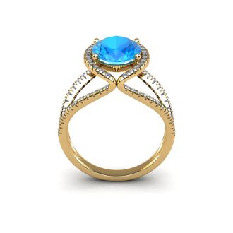 2 Carat Oval Shape Blue Topaz and Halo Diamond Ring In 14 Karat Yellow Gold