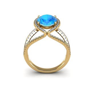 2 Carat Oval Shape Blue Topaz and Halo Diamond Ring In 14 Karat Yellow Gold