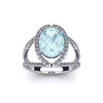 Aquamarine Ring: Aquamarine Jewelry: 1 1/2 Carat Oval Shape Aquamarine and Halo Diamond Ring In 14 Karat White Gold
