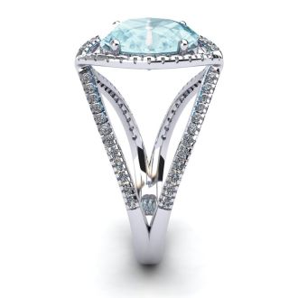 Aquamarine Ring: Aquamarine Jewelry: 1 1/2 Carat Oval Shape Aquamarine and Halo Diamond Ring In 14 Karat White Gold
