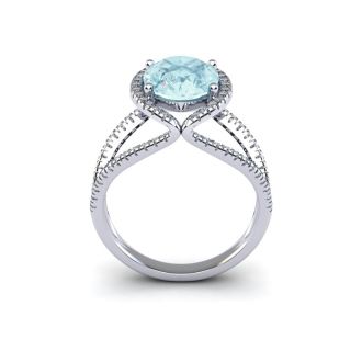 Aquamarine Ring: Aquamarine Jewelry: 1 1/2 Carat Oval Shape Aquamarine and Halo Diamond Ring In 14 Karat White Gold
