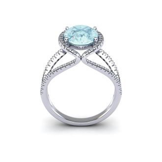 Aquamarine Ring: Aquamarine Jewelry: 1 1/2 Carat Oval Shape Aquamarine and Halo Diamond Ring In 14 Karat White Gold
