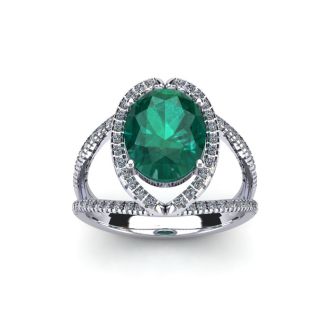 1 1/2 Carat Oval Shape Emerald and Halo Diamond Ring In 14 Karat White Gold

