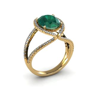 1 1/2 Carat Oval Shape Emerald and Halo Diamond Ring In 14 Karat Yellow Gold
