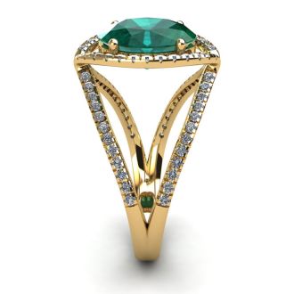 1 1/2 Carat Oval Shape Emerald and Halo Diamond Ring In 14 Karat Yellow Gold
