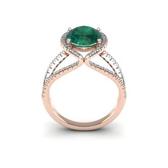 1 1/2 Carat Oval Shape Emerald and Halo Diamond Ring In 14 Karat Rose Gold
