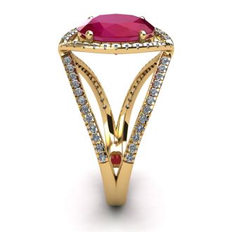 2 Carat Oval Shape Ruby and Halo Diamond Ring In 14 Karat Yellow Gold