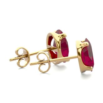 2 Carat Oval Shape Ruby Stud Earrings In 14K Yellow Gold Over Sterling Silver