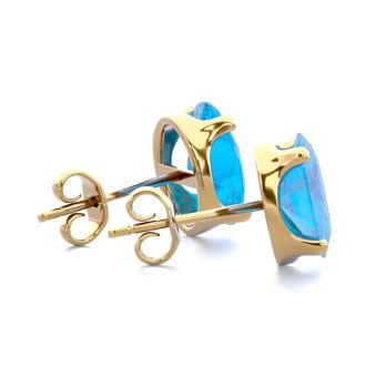 3 Carat Oval Shape Blue Topaz Stud Earrings In 14K Yellow Gold Over Sterling Silver