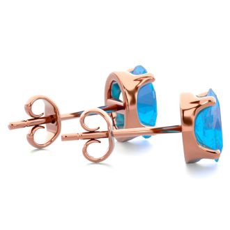 1 Carat Oval Shape Blue Topaz Stud Earrings In 14K Rose Gold Over Sterling Silver