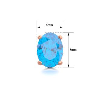 3 Carat Oval Shape Blue Topaz Stud Earrings In 14K Rose Gold Over Sterling Silver