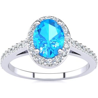 1 1/3 Carat Oval Shape Blue Topaz and Halo Diamond Ring In 14 Karat White Gold