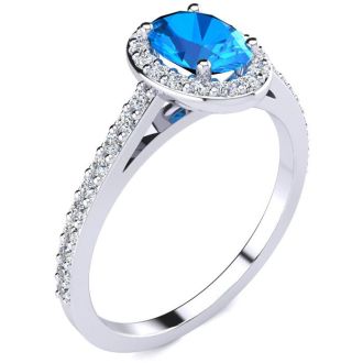 1 1/3 Carat Oval Shape Blue Topaz and Halo Diamond Ring In 14 Karat White Gold