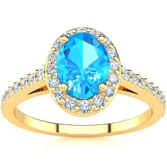 1 1/3 Carat Oval Shape Blue Topaz and Halo Diamond Ring In 14 Karat Yellow Gold