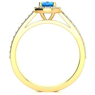 1 1/3 Carat Oval Shape Blue Topaz and Halo Diamond Ring In 14 Karat Yellow Gold