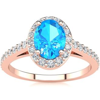 1 1/3 Carat Oval Shape Blue Topaz and Halo Diamond Ring In 14 Karat Rose Gold