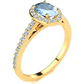 Aquamarine Ring: Aquamarine Jewelry: 1 Carat Oval Shape Aquamarine and Halo Diamond Ring In 14 Karat Yellow Gold