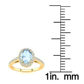 Aquamarine Ring: Aquamarine Jewelry: 1 Carat Oval Shape Aquamarine and Halo Diamond Ring In 14 Karat Yellow Gold