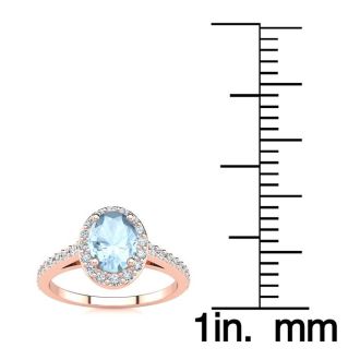 Aquamarine Ring: Aquamarine Jewelry: 1 Carat Oval Shape Aquamarine and Halo Diamond Ring In 14 Karat Rose Gold