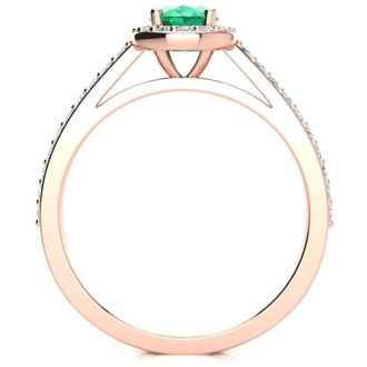 1 Carat Oval Shape Emerald and Halo Diamond Ring In 14 Karat Rose Gold