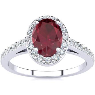 1 1/4 Carat Oval Shape Ruby and Halo Diamond Ring In 14 Karat White Gold
