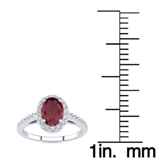 1 1/4 Carat Oval Shape Ruby and Halo Diamond Ring In 14 Karat White Gold