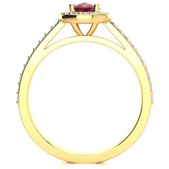 1 1/4 Carat Oval Shape Ruby and Halo Diamond Ring In 14 Karat Yellow Gold