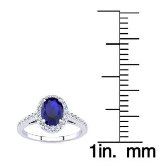 1 1/3 Carat Oval Shape Sapphire and Halo Diamond Ring In 14 Karat White Gold