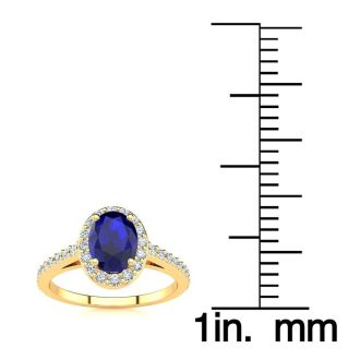 1 1/3 Carat Oval Shape Sapphire and Halo Diamond Ring In 14 Karat Yellow Gold