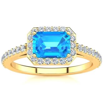 1 1/2 Carat Blue Topaz and Halo Diamond Ring In 14 Karat Yellow Gold