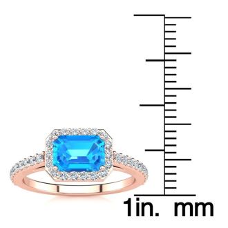 1 1/2 Carat Blue Topaz and Halo Diamond Ring In 14 Karat Rose Gold