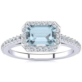 Aquamarine Ring: Aquamarine Jewelry: 1 1/4 Carat Aquamarine and Halo Diamond Ring In 14 Karat White Gold