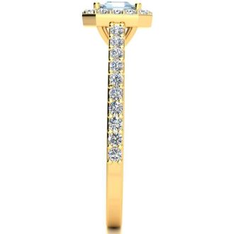 Aquamarine Ring: Aquamarine Jewelry: 1 1/4 Carat Aquamarine and Halo Diamond Ring In 14 Karat Yellow Gold