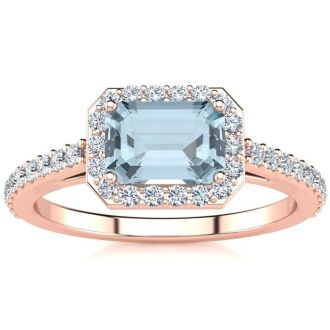 Aquamarine Ring: Aquamarine Jewelry: 1 1/4 Carat Aquamarine and Halo Diamond Ring In 14 Karat Rose Gold