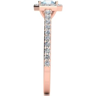 Aquamarine Ring: Aquamarine Jewelry: 1 1/4 Carat Aquamarine and Halo Diamond Ring In 14 Karat Rose Gold